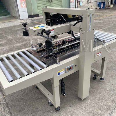 220V / 50HZ स्वचालित पैकिंग मशीन 12 मिमी कार्टन बॉक्स सीलर चिपकने वाला टेपिंग