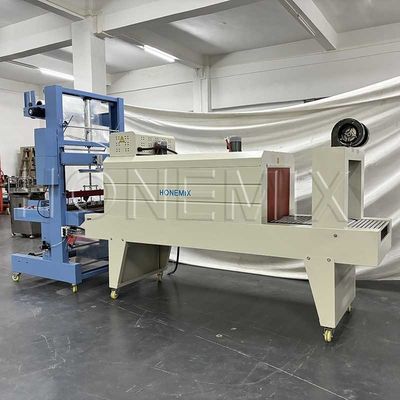 फिल्म सिकुड़ने वाली स्वचालित पैकिंग मशीन इन्फ्रारेड रे फिल्म कटिंग सीई
